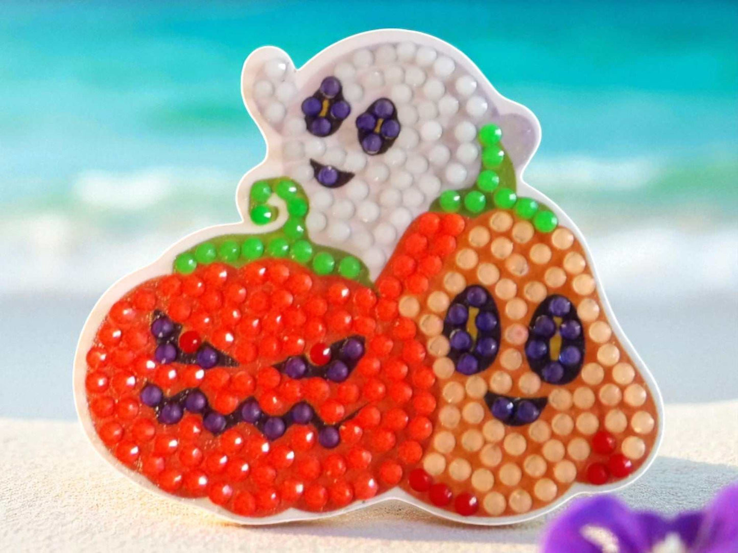 Glow in the dark Halloween family magnet featuring ghost and pumpkin designs