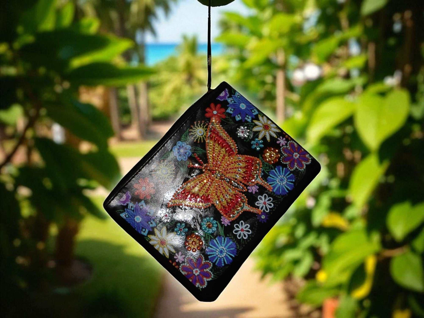 Golden Butterfly Large Hand Clutch with colorful floral and butterfly design, elegant and spacious hand purse