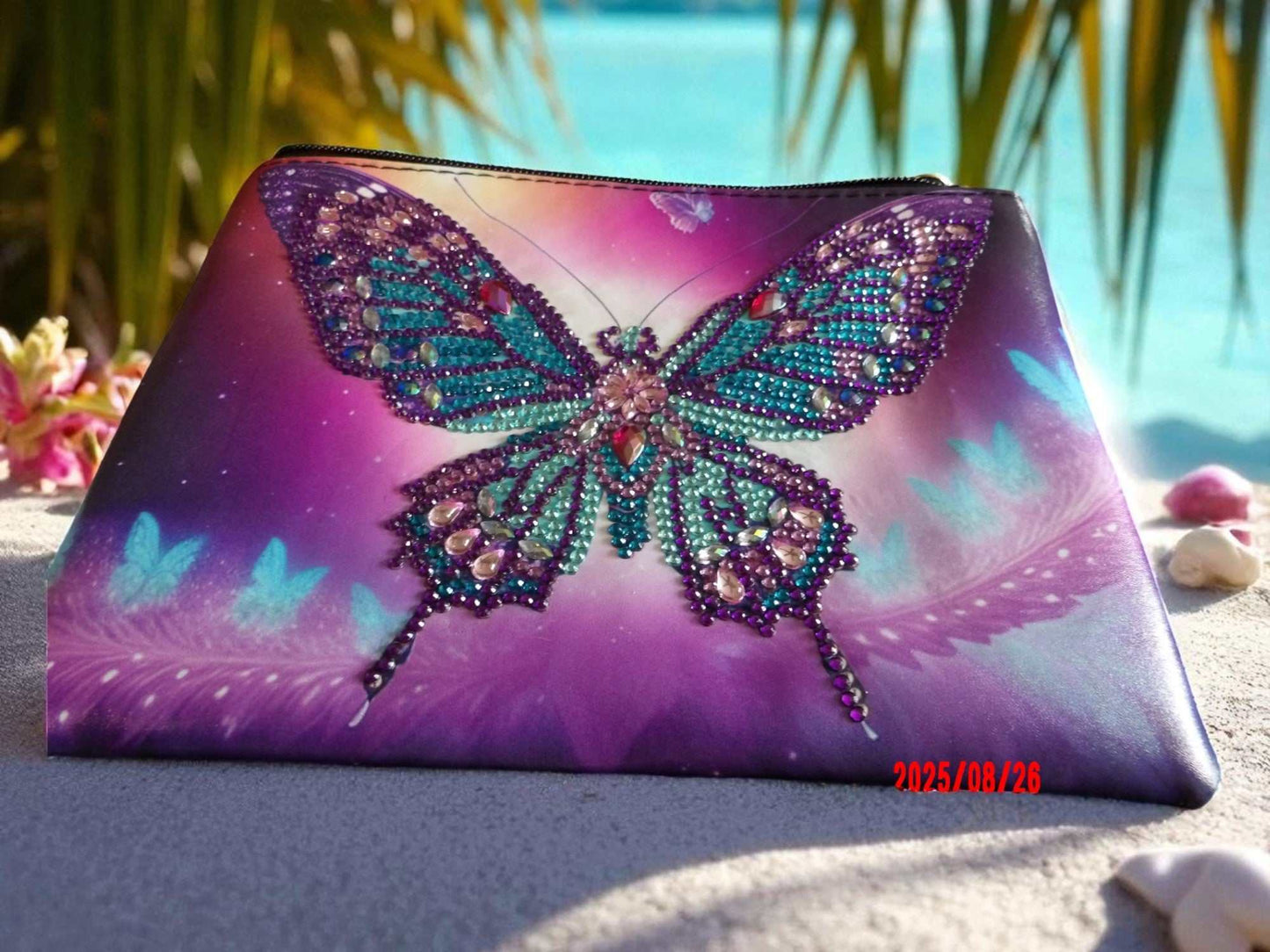 Large purple and blue butterfly hand clutch with jeweled design on vibrant background