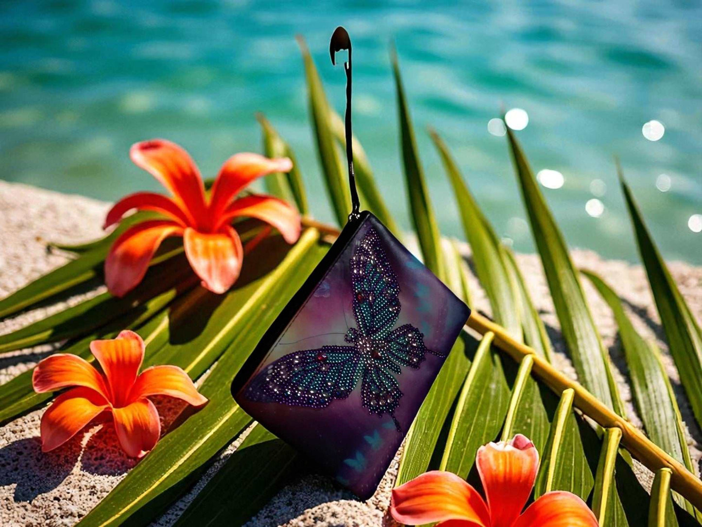 Large purple and blue butterfly hand clutch on tropical leaves near water
