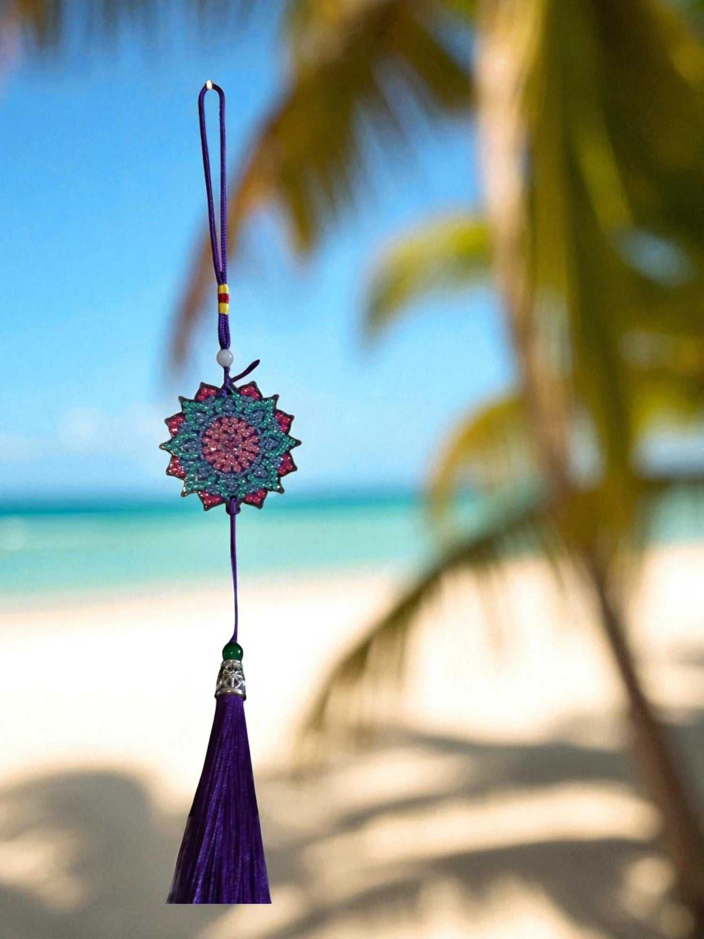 Navy blue colorful design car ornament hanging with beach background