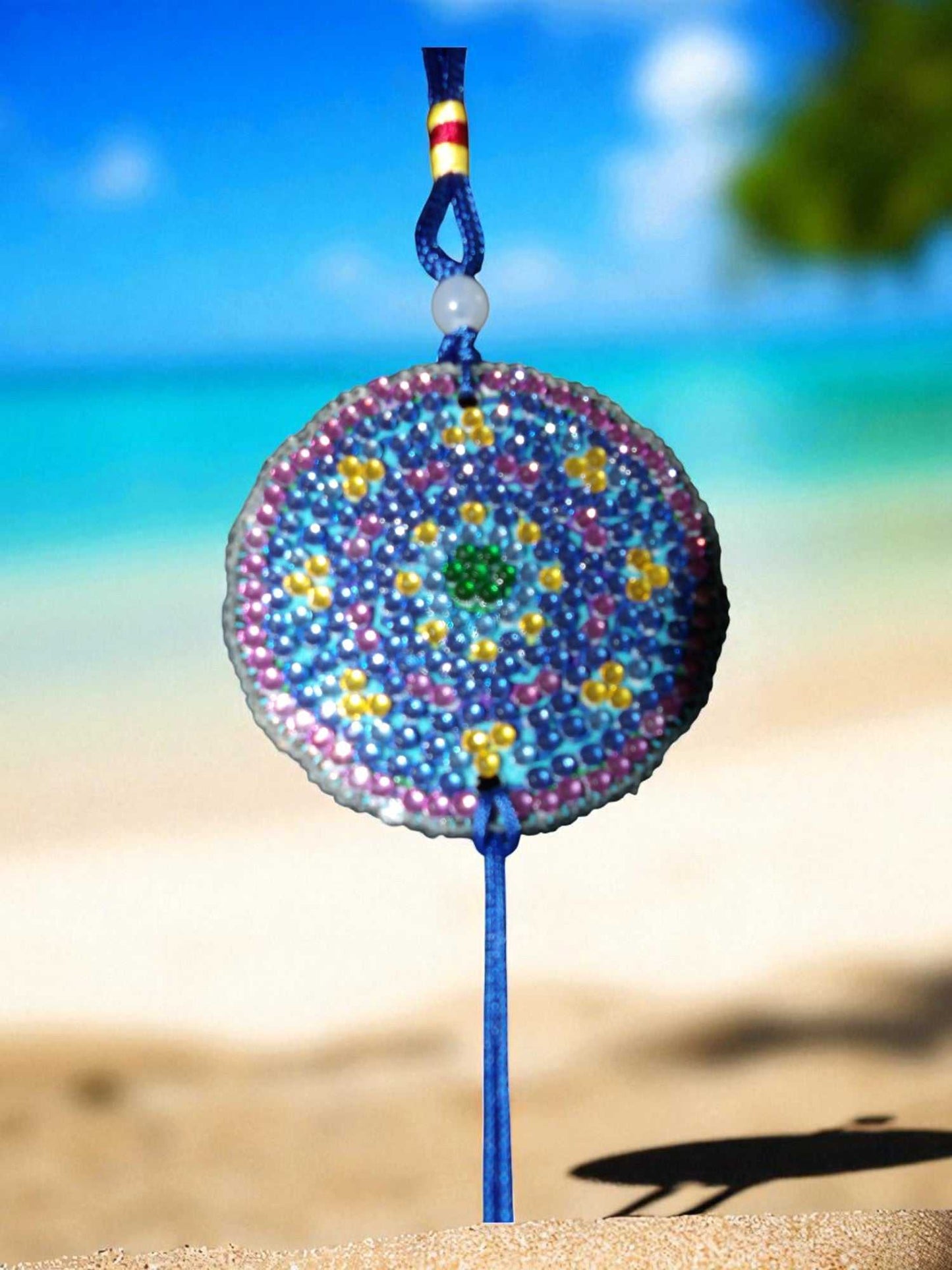 Blue and yellow colorful design car ornament hanging from rearview mirror with beaded pattern
