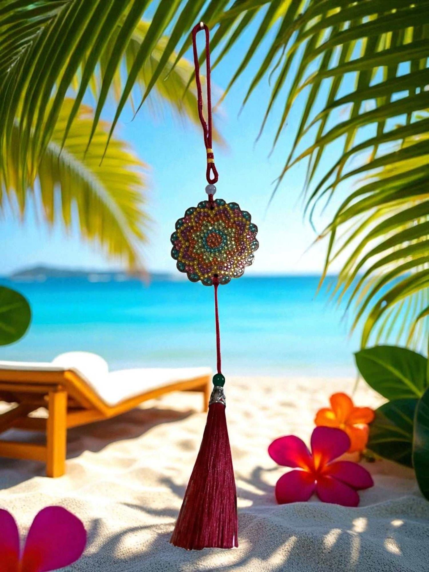 Pink Blue Yellow colorful design car ornament hanging with tassel on beach background