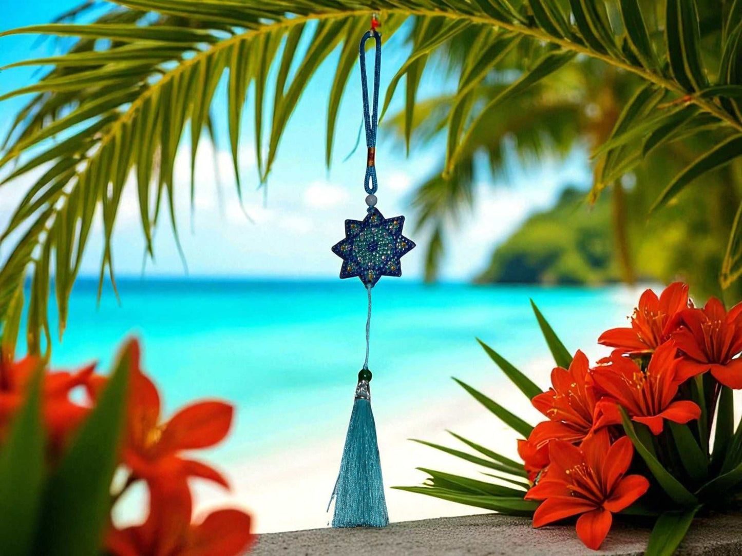 Light Blue Star colorful car ornaments hanging with tropical beach background