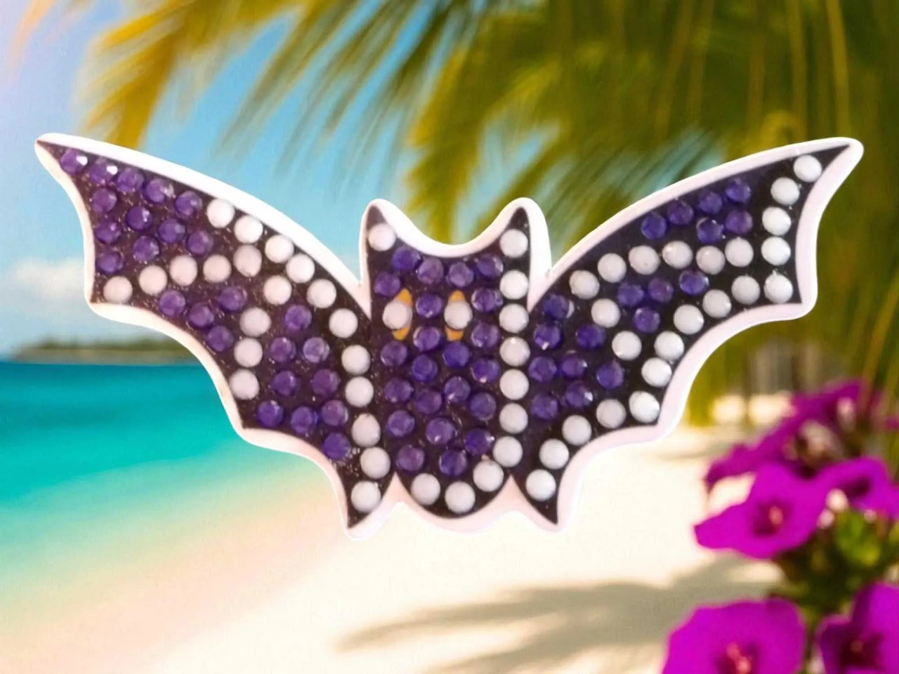 Glow in the dark flying bat magnet with purple and white colors