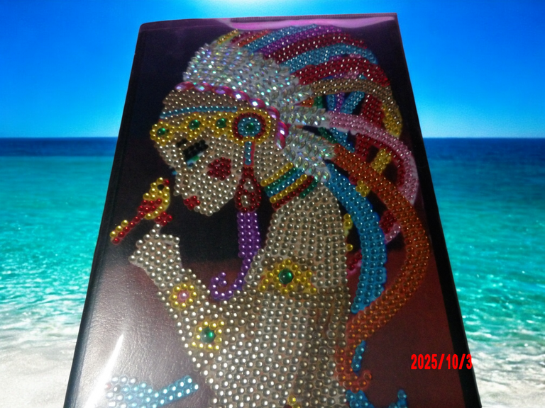 Journal Beautiful Colorful Headgear on a Woman Holding Small Chick